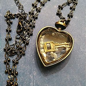 Pretty bronze floating heart pendant